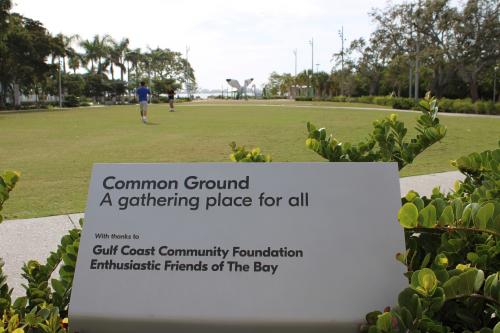 A sign overlooking Common Ground at The Bay Park with thanks to Gulf Coast Community Foundation Enthusiastic Friends of The Bay