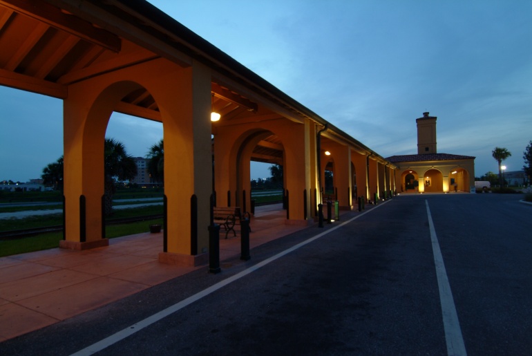 Covered walkway at dusk in a coastal town